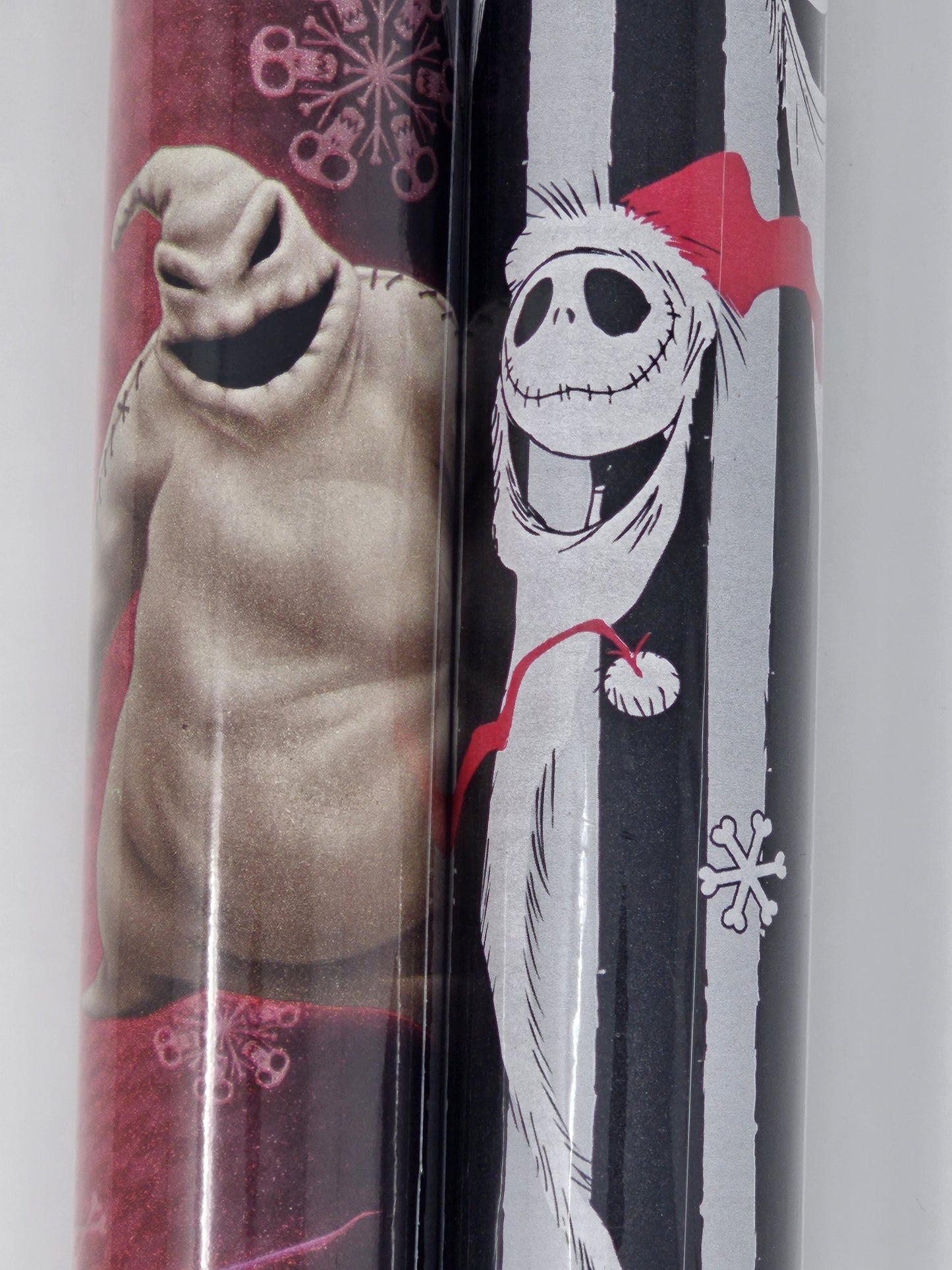 2 Rolls of Nightmare Before Christmas Wrapping Paper, 1 Roll 60 Sq Ft of Nightmare Before Christmas Jack Skellington Snowy Wrapping paper and 1 Roll 60 Sq Ft of Oogie Boogie, Barrel, Sally and Jack Skellington Wrapping Paper, With 6 Holiday Gift Tags.