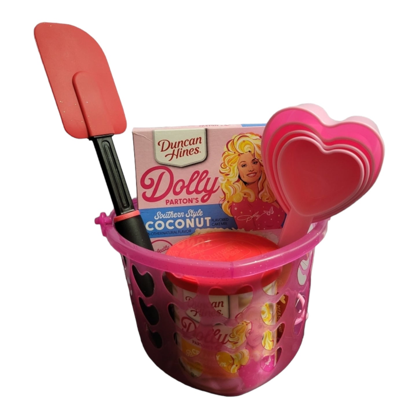 Dolly Parton Cake Gift Bundle for Valentine's Day, 1 15.25 oz box of cake mix, 1 16 oz container of frosting, 1 spatula, and a heart shaped basket