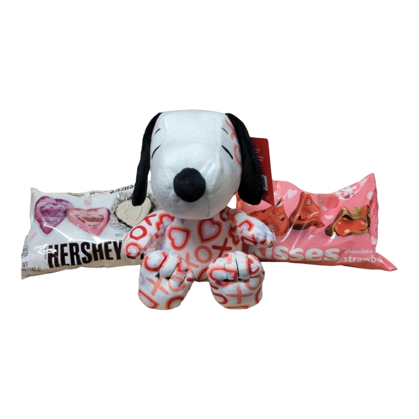 Valentines's Day Snoopy Bundle Basket. 1 plush Heart Snoopy, 1 9 oz bag Hershey's Chocolate Dipped Strawberry Kisses, 1 8.8 oz bag of Hershey's Pink Cookies N' Creme Hearts, with Heart Shaped Basket