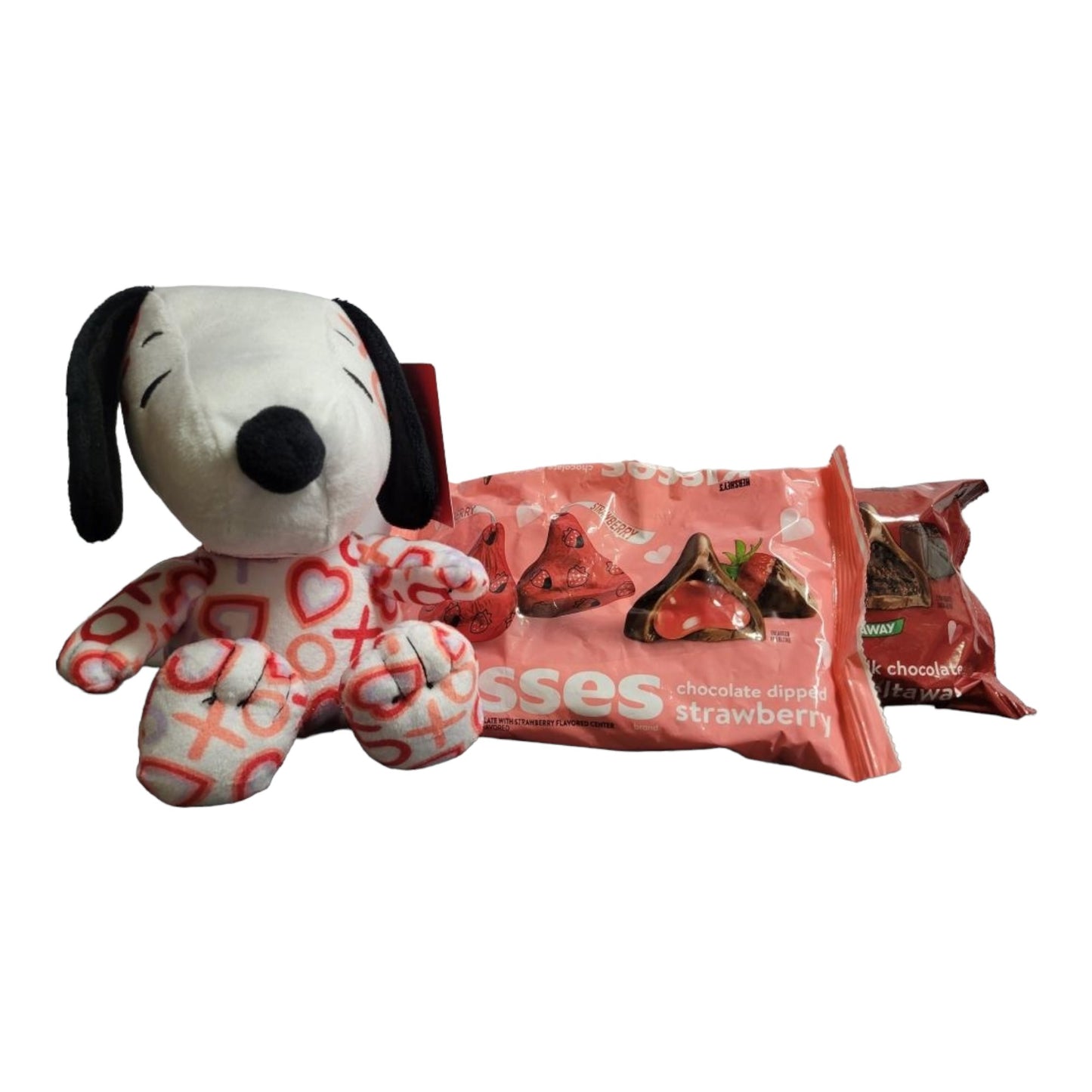 Valentines's Day Snoopy Bundle Basket. 1 plush Heart Snoopy, 1 9 oz bag Hershey's Chocolate Dipped Strawberry Kisses, 1 8.8 oz bag of Hershey's Pink Cookies N' Creme Hearts, with Heart Shaped Basket