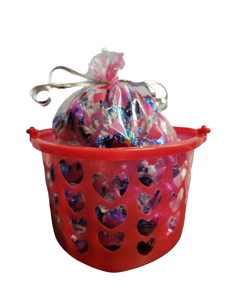 Valentines's Day Snoopy Bundle Basket. 1 plush Heart Snoopy, 1 9 oz bag Hershey's Chocolate Dipped Strawberry Kisses, 1 8.8 oz bag of Hershey's Pink Cookies N' Creme Hearts, with Heart Shaped Basket