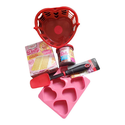 Dolly Parton Cake Gift Bundle for Valentine's Day, 1 15.25 oz box of cake mix, 1 16 oz container of frosting, 1 spatula, and a heart shaped basket