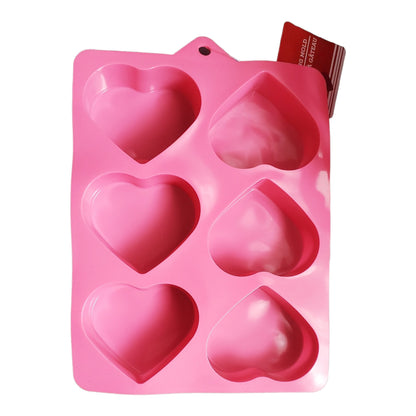 Dolly Parton Cake Gift Bundle for Valentine's Day, 1 15.25 oz box of cake mix, 1 16 oz container of frosting, 1 spatula, and a heart shaped basket