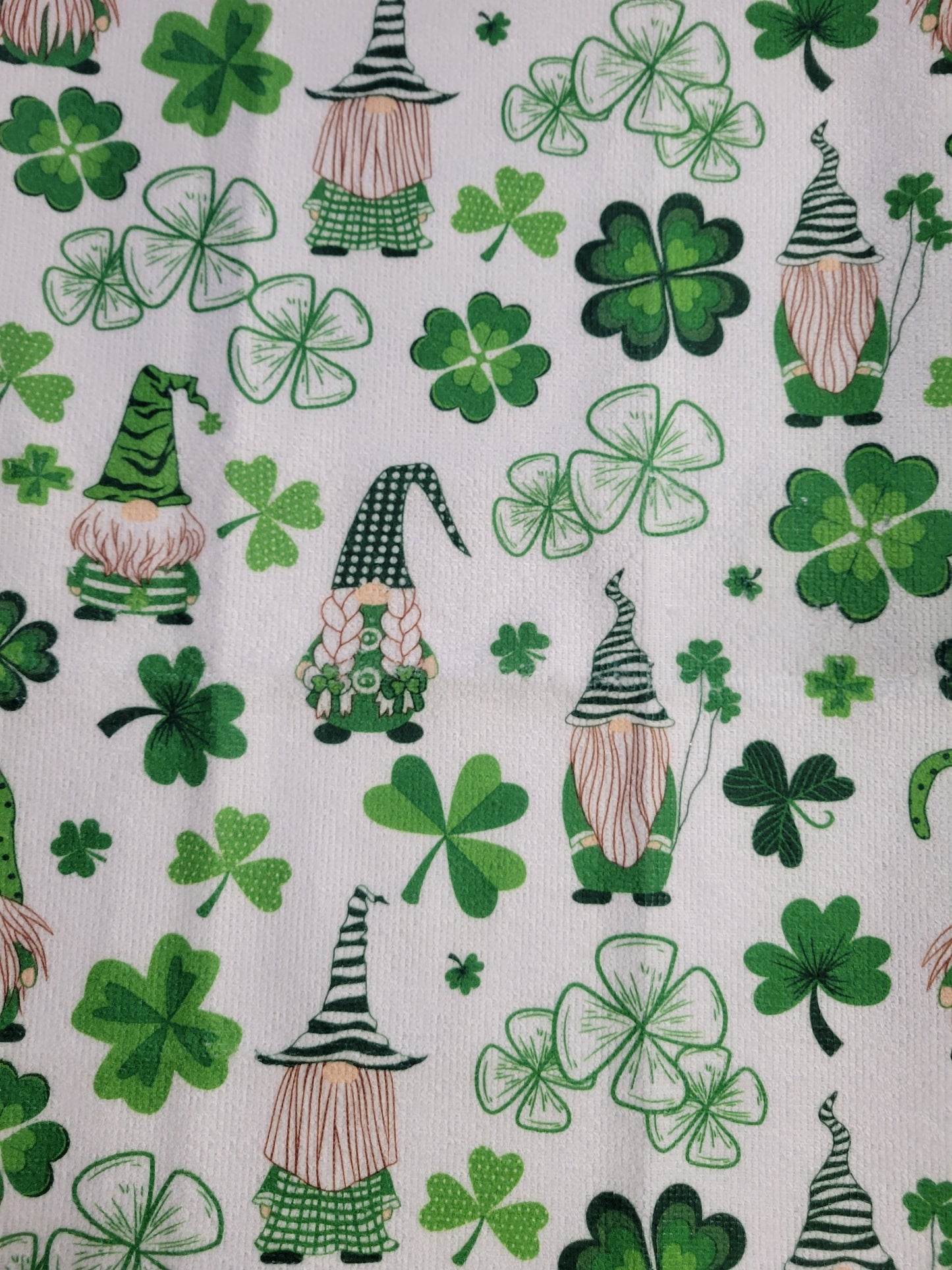 Putt Pantry St. Patricks Day Gnome Decor Bundle, 2 Decorative St Patty Kitchen Towels, Set of Gnome Salt and Pepper Shakers, 1 lb of Milk Chocolate Mint Truffles, packaged by Putt Pantry in a Wire Basket.